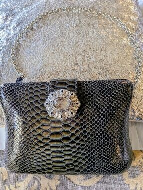 Brighton Black/Gun Metal Gray.  Faux-Snake Clutch with Crystal Floral Medallion
